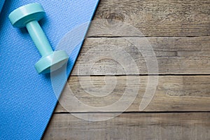 Dumbbell and yoga mat