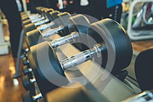 dumbbells in the gym at sports club for exercise and Bodybuilding