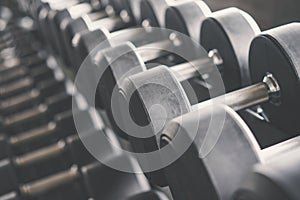 Dumbbells in the gym at sports club for exercise and Bodybuilding