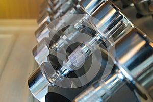 dumbbells in the gym at sports club for exercise and Bodybuilding