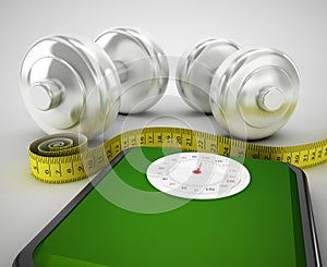 dumbbells tied with a measuring tape on a weighting scale photo