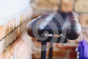 dumbbells and weights on shelves