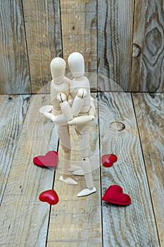 Dummies couple embracing love of wood