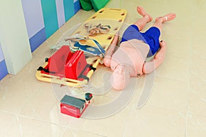 Dummy and stretcher in training cpr medical emergency refresher