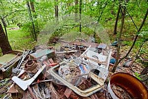 Dump old metal objects in the woods, rusty scrap metal. Environ