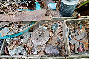 Dump old metal objects in the woods, rusty scrap metal. Environ