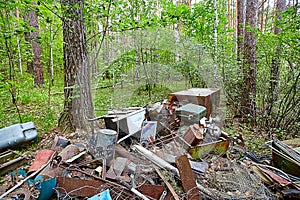 Dump old metal objects in the woods, rusty scrap metal. Environ