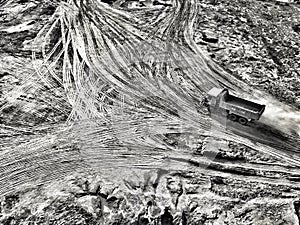 Dump truck carrying coal, sand and rock