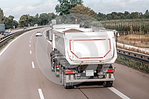 Dump truck on a highway road.