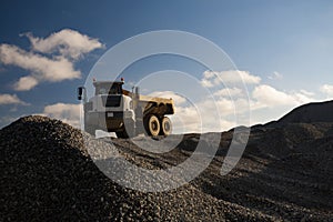 Dump Truck on the Pile of Gravel