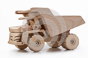 Dump truck toy car made of wood.