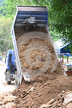 Dump Truck Unloading Soil