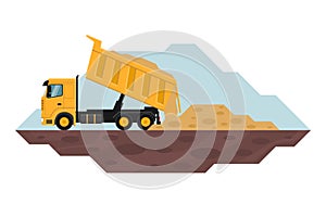 Dump truck unloading waste, heavy machinery used in the construction and mining industry