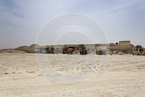 Dump trucks on Al Qiddiya project construction site. photo