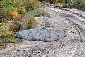 Dumped excess concrete on roadside