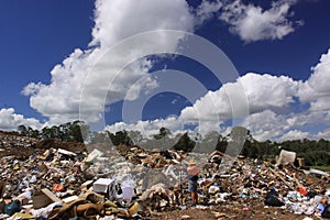 Dumped garbage near a landfill photo