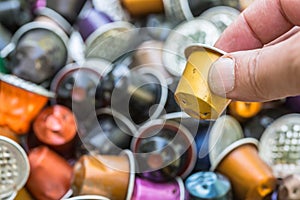 Dumped plastic and metal espresso coffee capsules environmental issue