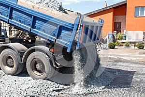 Dumper unload crushed stone