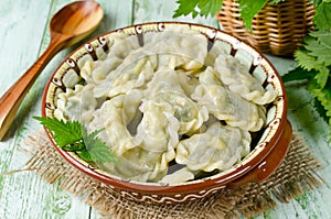 Dumplings with cheese and nettles in a bowl