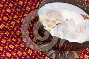 Dumplings in coconut cream Bua Loi and coconut meat with egg i