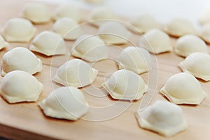 .Dumplings with minced meat sculpts cook in the kitchen.