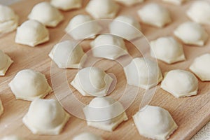 Dumplings with minced meat sculpts cook in the kitchen.