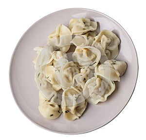 Dumplings on a plate isolated on white background .meat dumplings top view