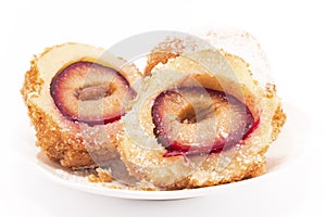 Dumplings with plums isolated on white