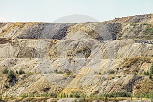 Dumps of processed iron ore. Waste from the iron ore industry. Close-up.