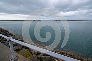 Dun Laoghaire port entry with West pier and East pier light houses