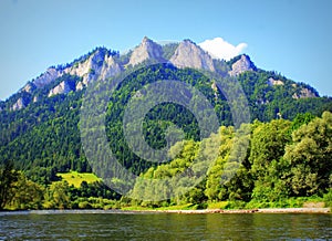 Dunajec river and Three Crowns peak in Pieniny mountains at summer, Poland