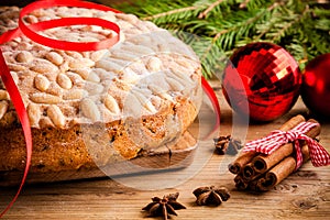 Dundee cake on a wooden table