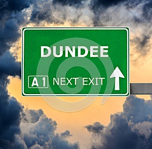 DUNDEE road sign against clear blue sky