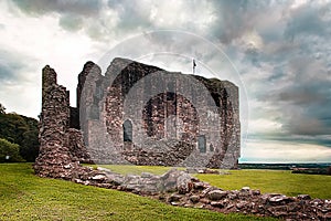 Dundonald Castle Ruins on a cloudy day with green grass