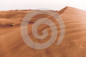 Dune bashing adventure at Dubai desert on Oman road. Natural textures,