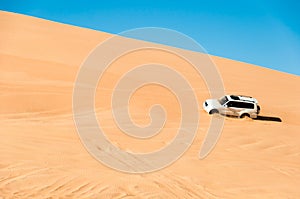 Dune bashing on summer, blur movement of sand