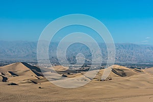 dune buggies in the peruvian coast at Ica Peru photo