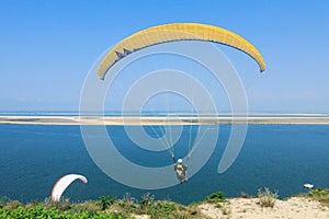 Dune of Pyla paraglading, front of the Banc d`Arguin