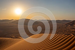 Waves in the dunes in the desert of Rub al Khali or Empty Quarter photo