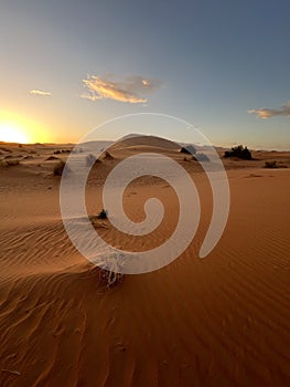 Dunes in the Sahara desert, Merzouga desert, setting sun. Morocco