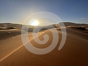 Dunes in the Sahara desert, Merzouga desert, setting sun. Morocco