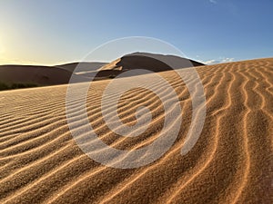Dunes in the Sahara desert, Merzouga desert, setting sun. Morocco