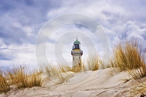 Dunes of WarnemÃ¼nde with lighthouse