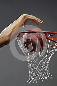 Dunking a basketball