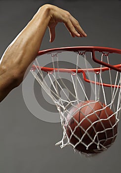 Dunking a basketball