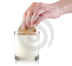 Dunking cookie in milk