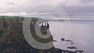 Dunluce Castle, County Antrim Coast, Northern Ireland. Aerial drone vi
