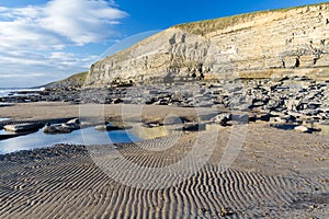 Dunraven Bay, or Southerndown beach, with limestone cliffs.