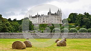 Dunrobin castle and gardens, straw bales outside the castle wall, Scotland landmark, United Kingdom, travel Europe