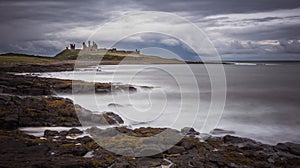 Dunstanburgh Castle Next To The Sea